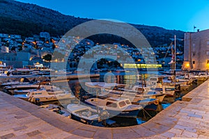 Sunrise view of boats mooring in the old port of Dubrovnik, Croatia