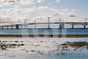 Sunrise view of the Chesapeake Bay Bridge from Sandy Point State Park, in Annapolis, Maryland photo