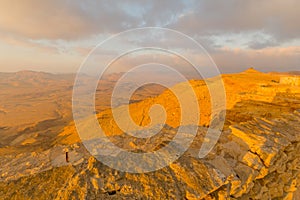 Sunrise view of cliffs and landscape in Makhtesh crater Ramon