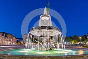 Sunrise view of a fountain at Schlossplatz in Stuttgart, Germany