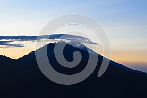 Sunrise view from Gunung Batur volcano in Bali with visible Mount Agung volcano photo