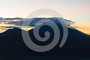 Sunrise view from Gunung Batur volcano in Bali with visible Mount Agung volcano photo