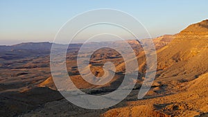 Sunrise view of HaMakhtesh HaGadol the big crater, in the Negev Desert, Southern Israel. It is a geological landform of a large
