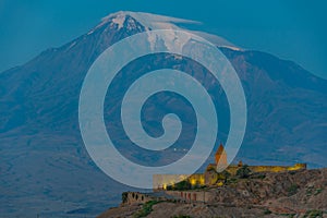 Sunrise view of Khor Virap Monastery standing in front of Ararat