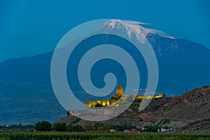 Sunrise view of Khor Virap Monastery standing in front of Ararat