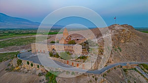 Sunrise view of Khor Virap Monastery standing in front of Ararat