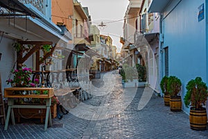 Sunrise view of a tourist street in Greek town Chania at Crete i
