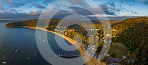 Sunrise views over the bay with boats and mountain ranges from Patonga