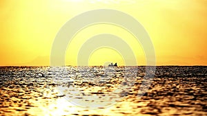 sunrise wave sea fishermen