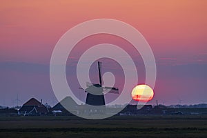 Sunrise with windmill Hargermolen, Bergen - Schoorl, The Netherlands