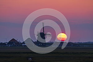 Sunrise with windmill Hargermolen, Bergen - Schoorl, The Netherlands