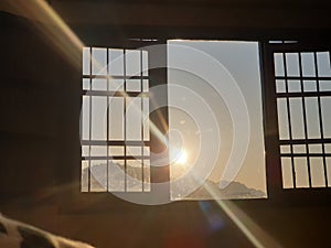 sunrise through window photo