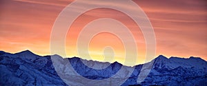 Sunrise of Winter panoramic, view of Snow capped Wasatch Front Rocky Mountains, Great Salt Lake Valley and Cloudscape from the Mou