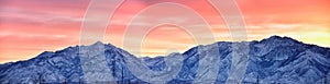 Sunrise of Winter panoramic, view of Snow capped Wasatch Front Rocky Mountains, Great Salt Lake Valley and Cloudscape from the Mou