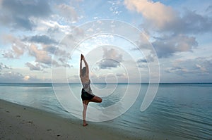 Sunrise yoga on Aitutaki Lagoon Cook Islands