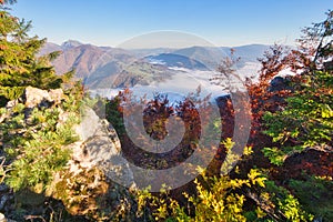 Sunrise from Zadny Sip mountain during autumn with inversion mist in the valley