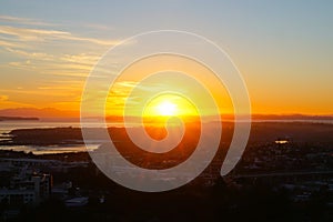 Sunrises over Auckland from top Mount Eden photo