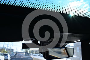 sunroof of car with blue sky, interior design