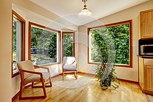 Sunroom interior with two chairs