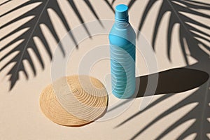 sunscreen bottle with palm tree shadow