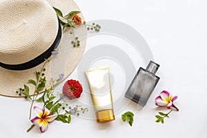 Sunscreen spf50  cosmetics health care for skin face with hat ,perfume and  flower frangipani ,zinnia