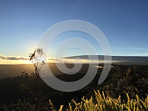 Sunset above Halemaâ€™umaâ€™u Crater and Mauna Loa at Hawaii Volcanoes National Park on Big Island, Hawaii.