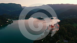 Sunset above Lake Bled in Slovenia with Julian Alps and Island in middle