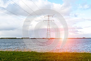 Sunset above the modern high powerlines