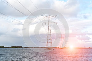 Sunset above the modern high powerlines