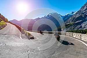 Sunset above motorbike on Passo Stelvio