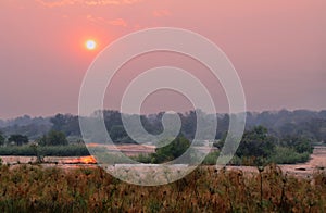 Sunset above Okavango river