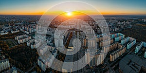 Sunset above panorama of modern residential area in Voronezh, aerial view from drone