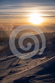 Sunset above ski slope in Slovakia tatra mountains