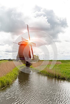 Sunset above windmill