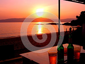 Sunset across the sea at Agia Eleni beach Skiathos, Greece