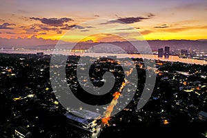 Sunset Aerial of Metro Cebu Skyline and mountains as seen from Lapu-Lapu City Mactan photo