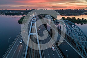 Sunset aerial view on a Darnitsky Bridge in Kyiv, Ukraine