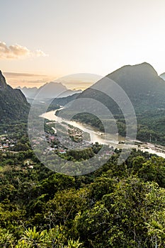 Sunset aerial view of Muang Ngoi Neua village and Nam Ou river from Phanoi viewpoint, La