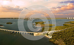 Sunset aerial view over Little Carlos Pass Bridge in Bonita Beach photo