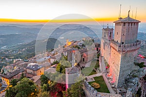 Sunset aerial view of San Marino with Torre Guaita