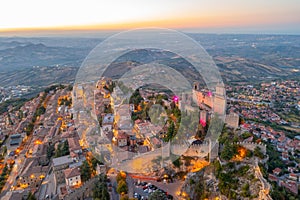 Sunset aerial view of San Marino with Torre Guaita