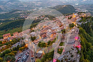 Sunset aerial view of San Marino with Torre Guaita