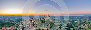 Sunset aerial view of San Marino with Torre Guaita