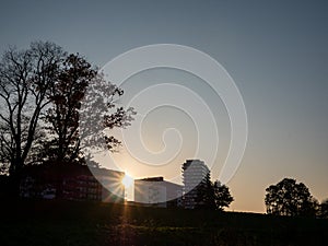 Sunset against the background of the block of flats, apartment buildings, in Europe in the field, new houses. Wroclaw, Poland