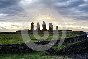 Sunset at Ahu Tahai, site with moai statues at Easter Island, Chile