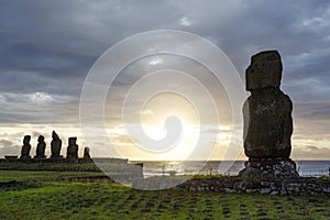 Sunset at Ahu Tahai, site with moai statues at Easter Island, Chile