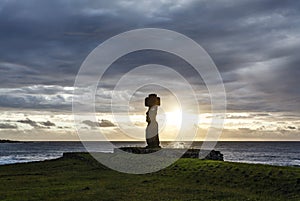 Sunset at Ahu Tahai, site with moai statues at Easter Island, Chile