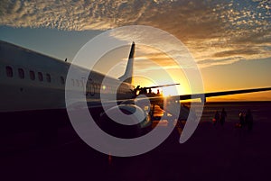 Sunset aircraft boarding photo