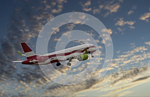 Sunset Airplane Travel. Airliner against the setting sun.