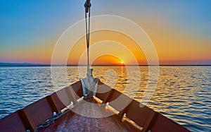 Sunset on the Albufera Canal boats in El Palmar in Valencia Spain